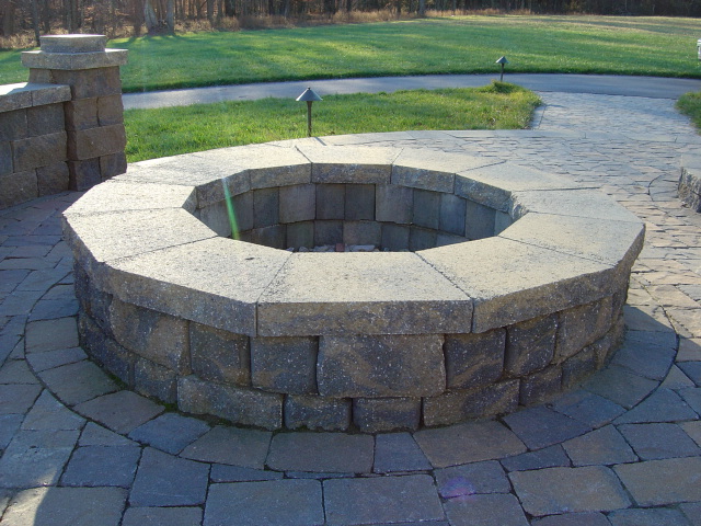 10 Best Outdoor Fire Pit Ideas to DIY or Buy: Circular Brick Fire Pit